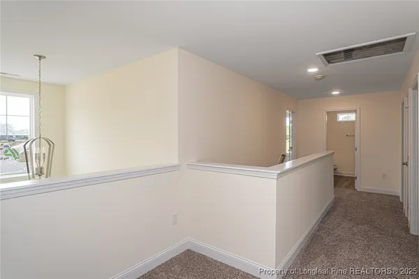 a view of a hallway with window