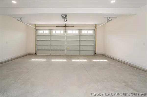 a view of a house with backyard and swimming pool