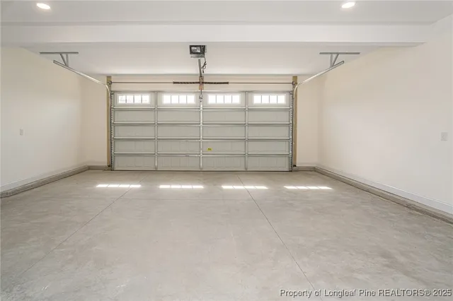 a view of a house with backyard and swimming pool