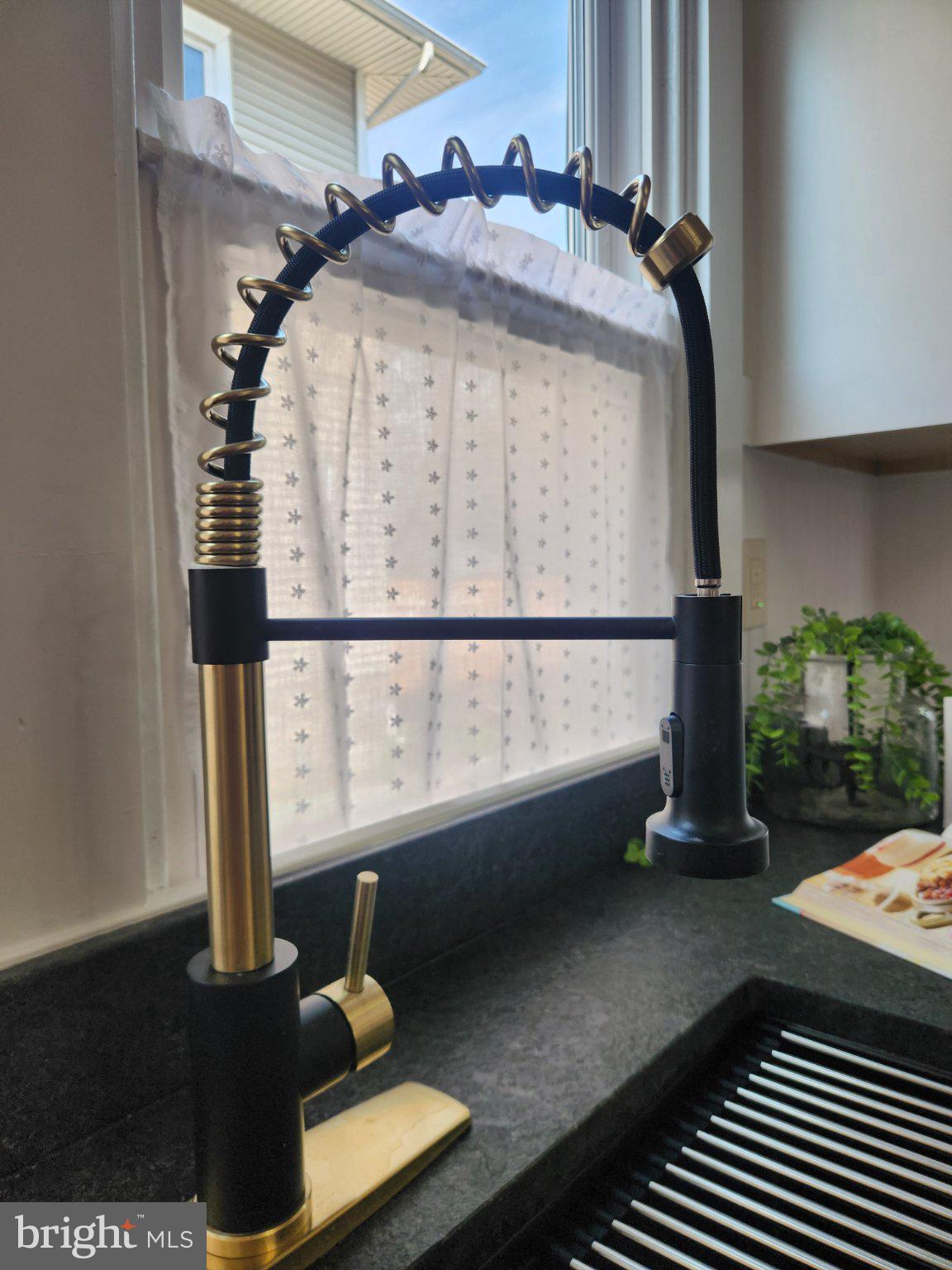 631 South Broad Street Lititz, PA 17543 - Photo 29 of 55 Sleek kitchen faucet with modern flair.