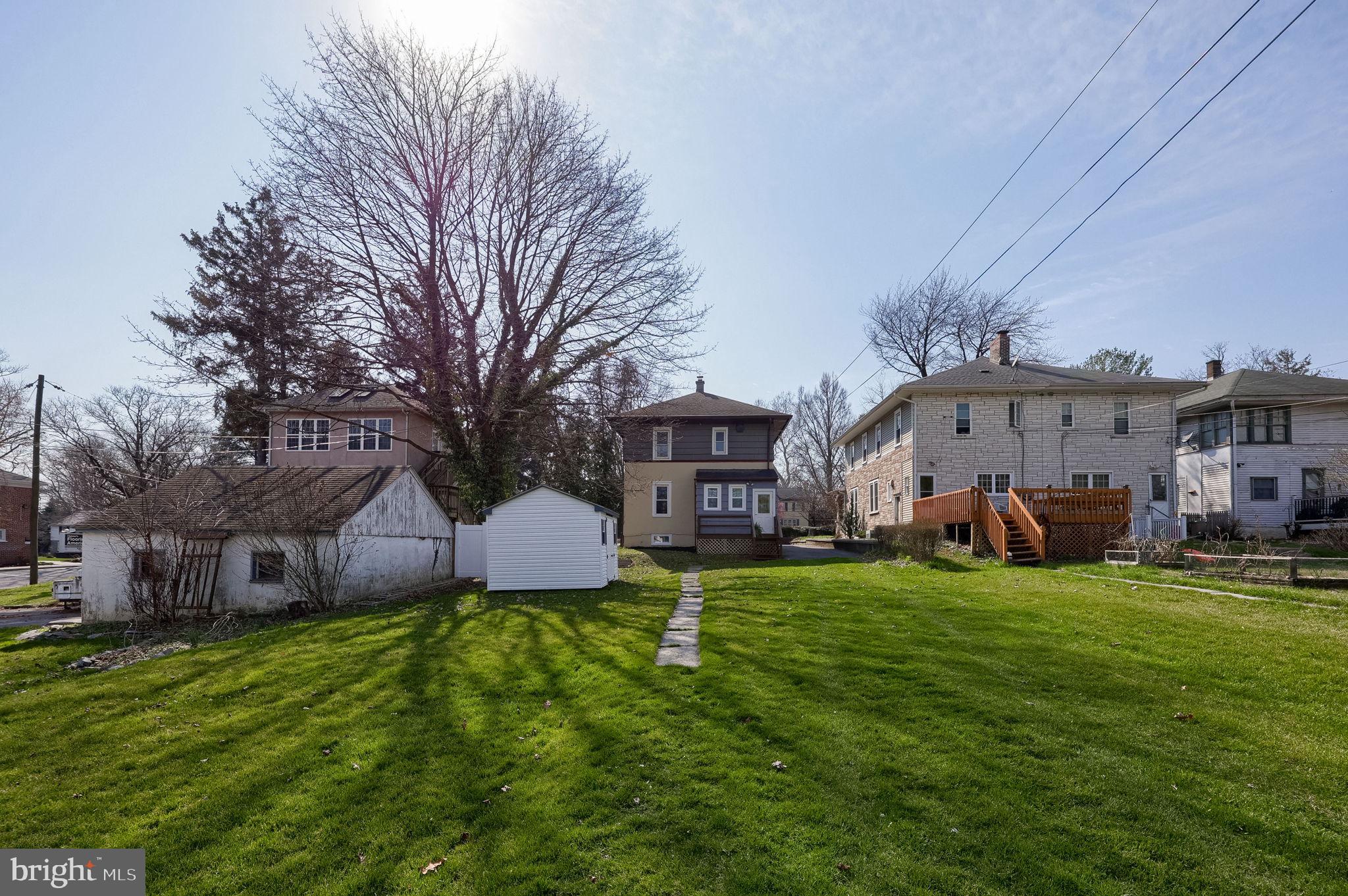 631 South Broad Street Lititz, PA 17543 - Photo 49 of 55 Charming homes on a sunny lawn.