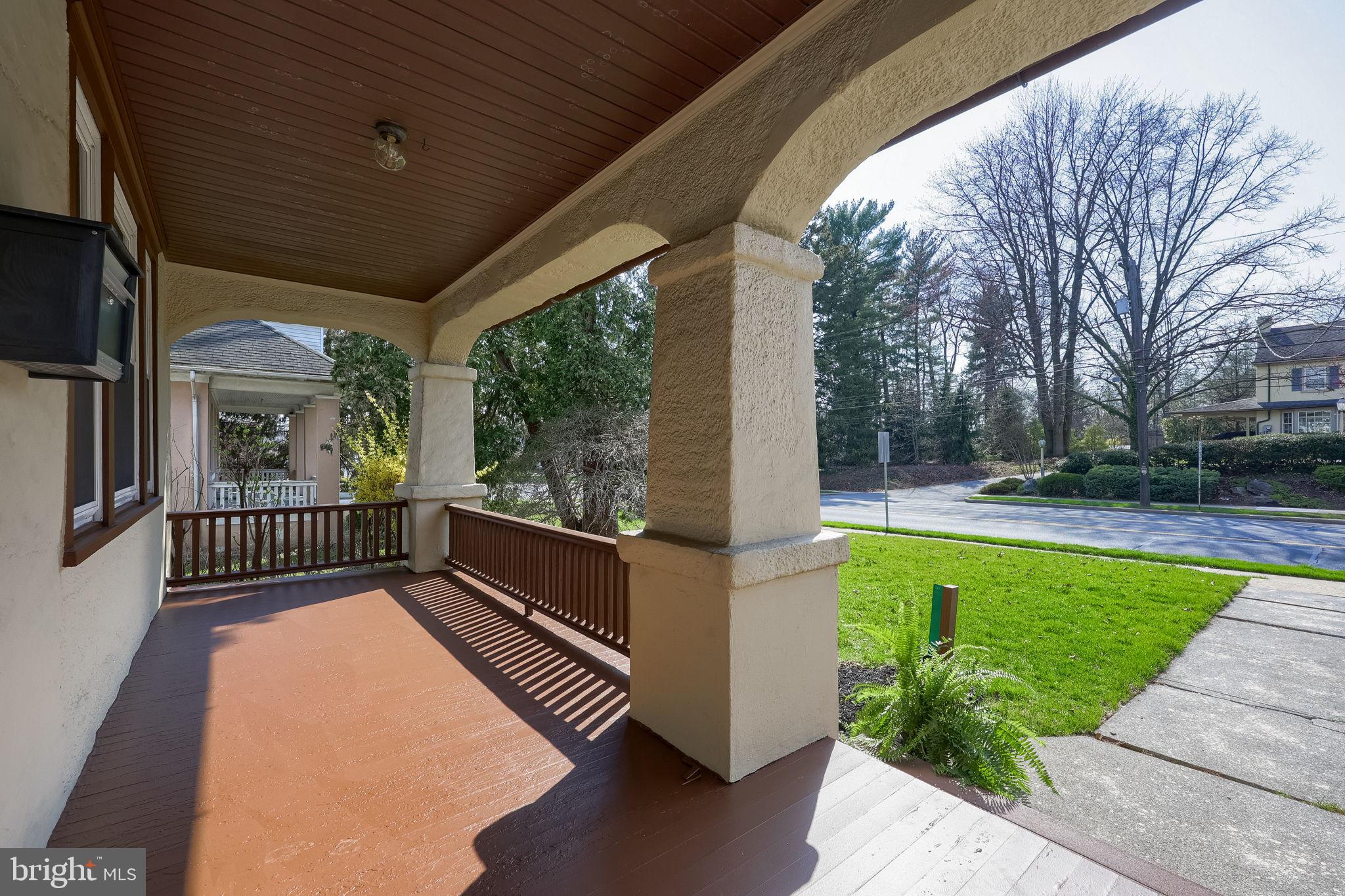 631 South Broad Street Lititz, PA 17543 - Photo 5 of 55 Charming porch with serene views.