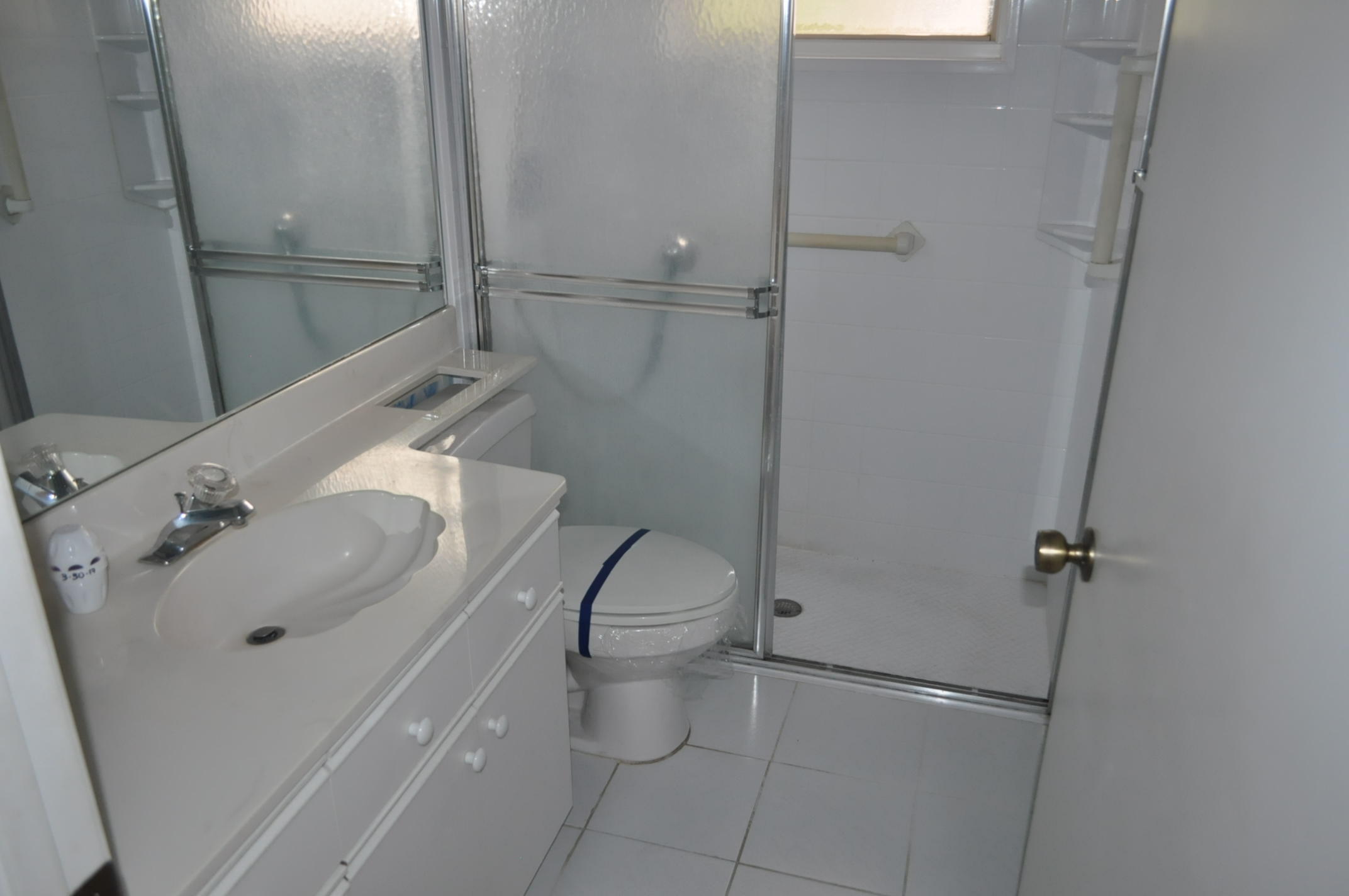11094 Autoro Court Boca Raton, FL 33498 - Photo 5 of 17 a bathroom with a sink and toilet