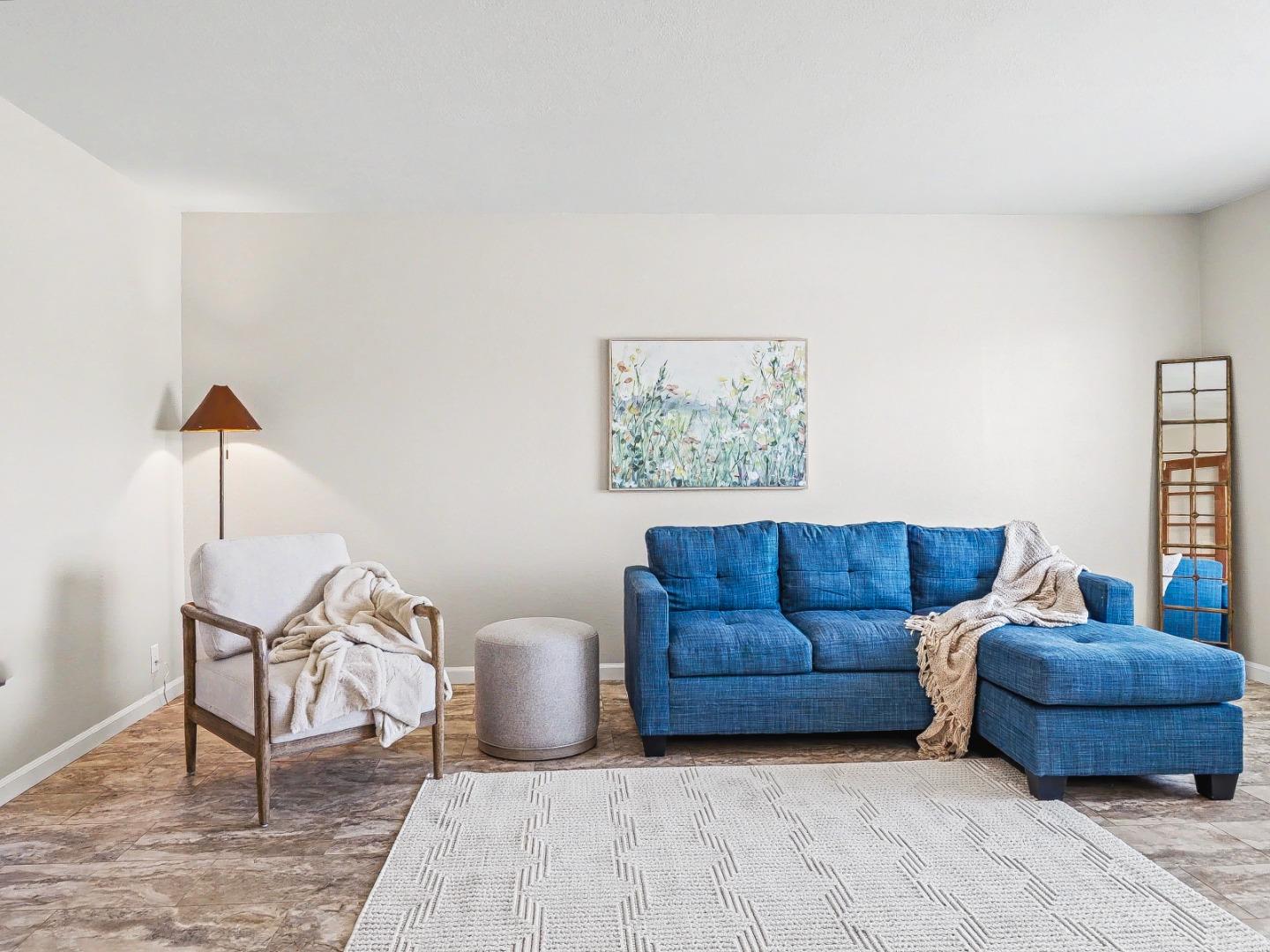 6455 Kensington Place Gilroy, CA 95020 - Photo 2 of 32 a living room with furniture and a couch