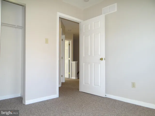 a view of a livingroom with wooden floor