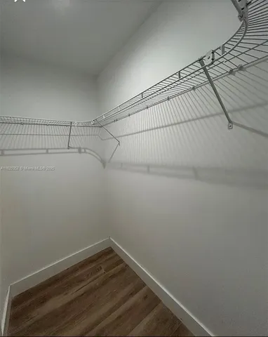 a view of a room with racks on the wall
