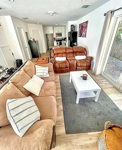 a living room with furniture and a couch