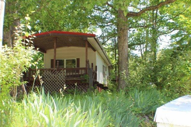 190 Maple Street Corinth, KY 41010 - Photo 2 of 15 covered deck allows you a good place to