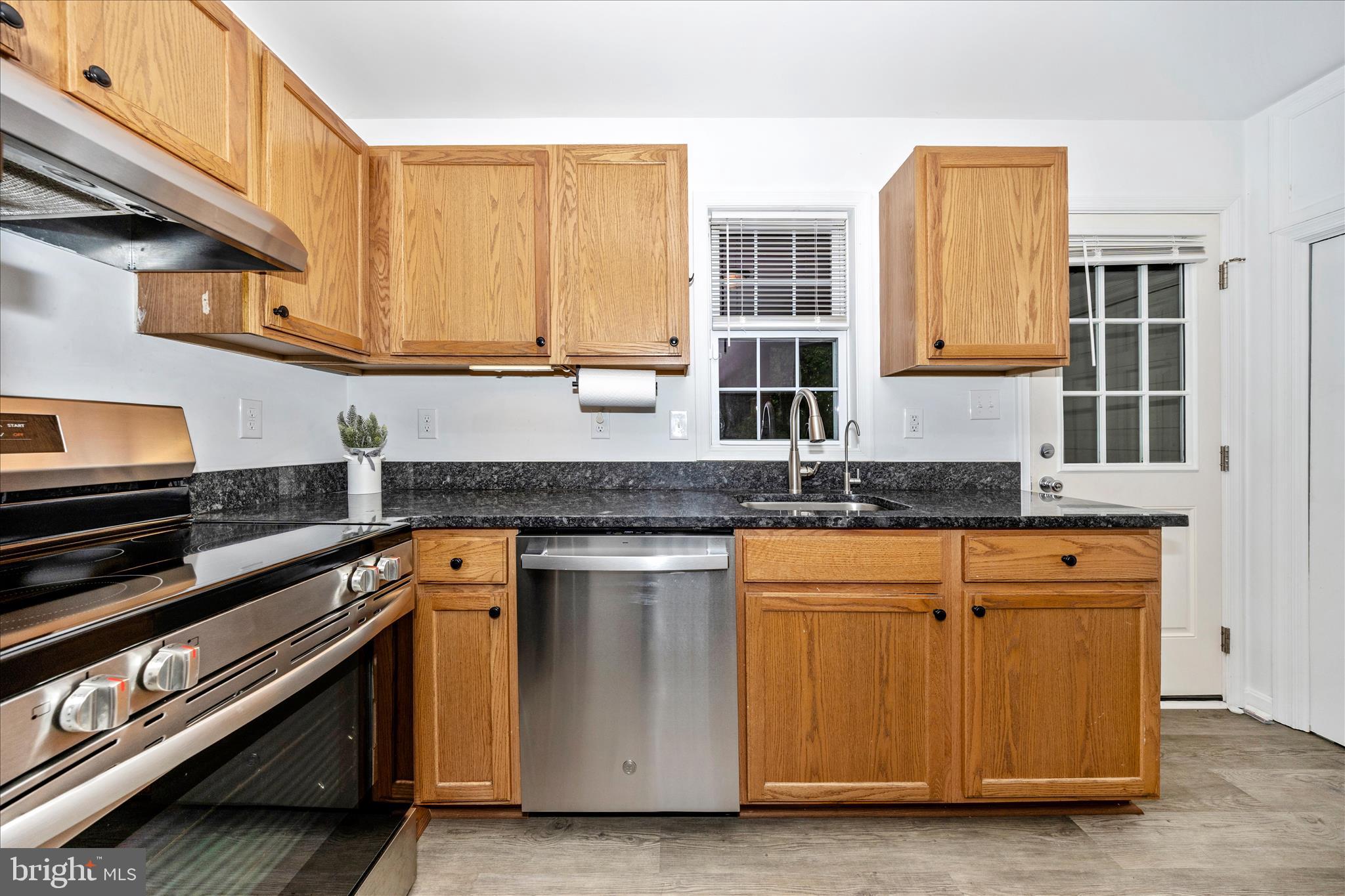 916 Harwood Road Hagerstown, MD 21740 - Photo 19 of 52 a kitchen with stainless steel appliances granite countertop a stove and a sink