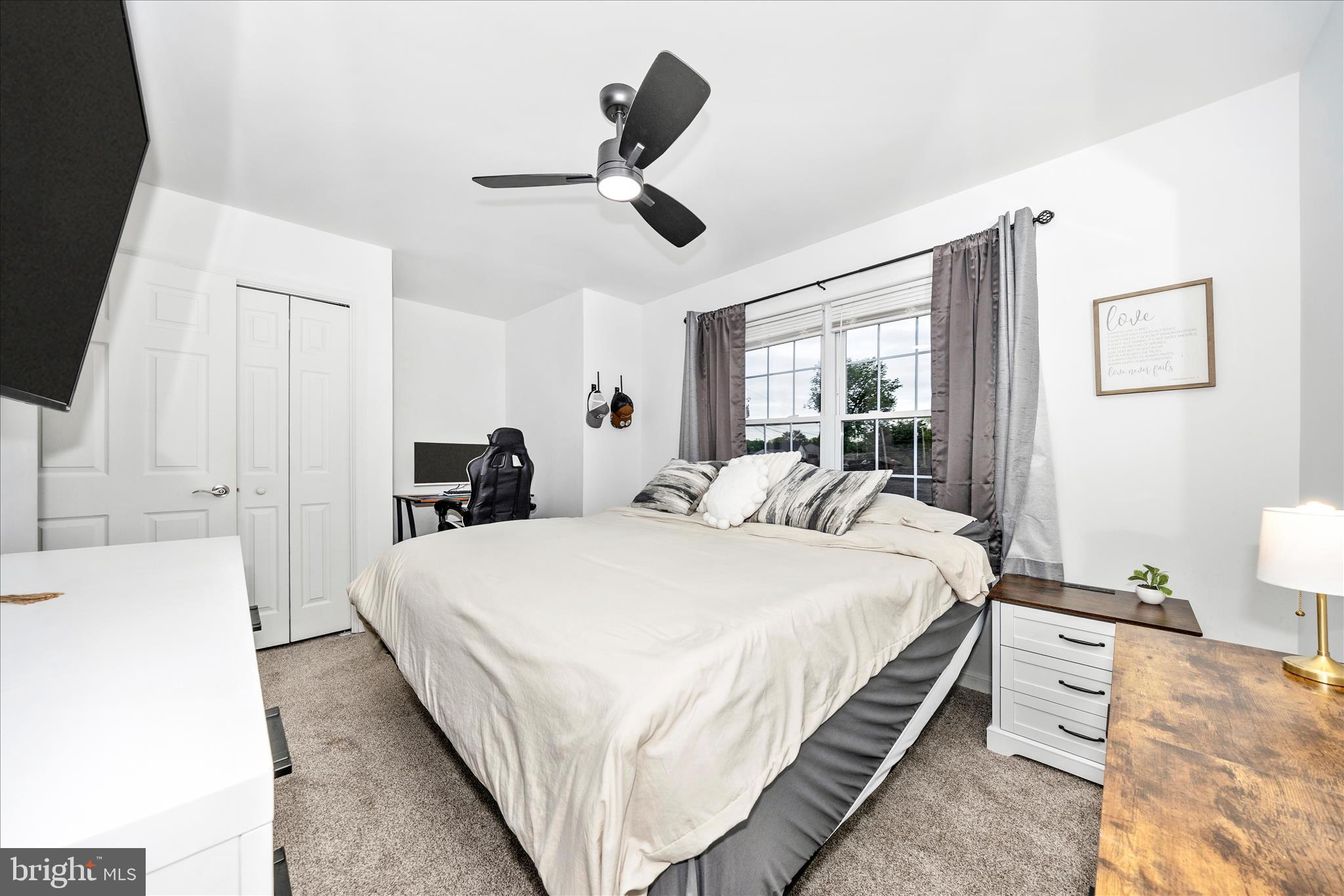 916 Harwood Road Hagerstown, MD 21740 - Photo 28 of 52 a spacious bedroom with a bed and window