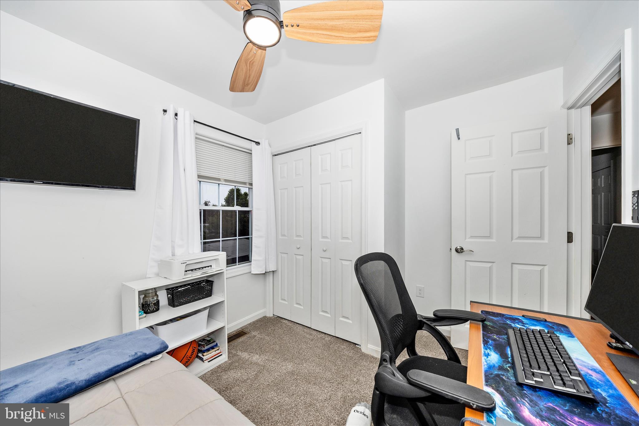 916 Harwood Road Hagerstown, MD 21740 - Photo 30 of 52 a view of a workspace with furniture and a flat screen tv