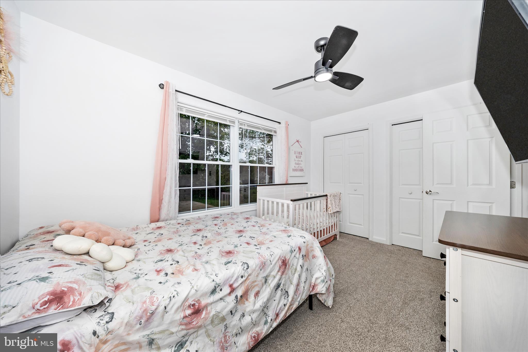 916 Harwood Road Hagerstown, MD 21740 - Photo 34 of 52 a bedroom with a bed and a large window