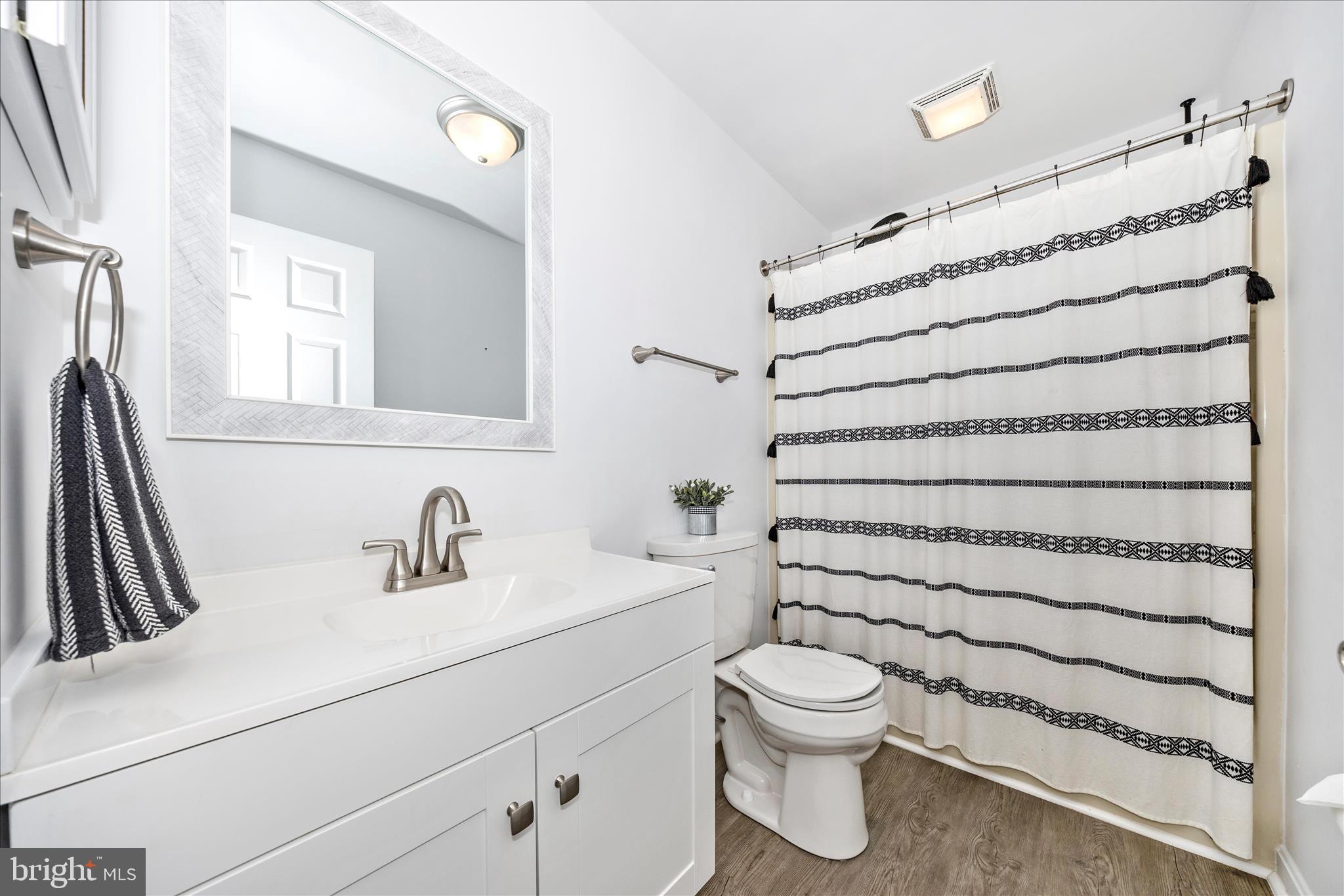 916 Harwood Road Hagerstown, MD 21740 - Photo 37 of 52 a bathroom with a toilet sink and shower