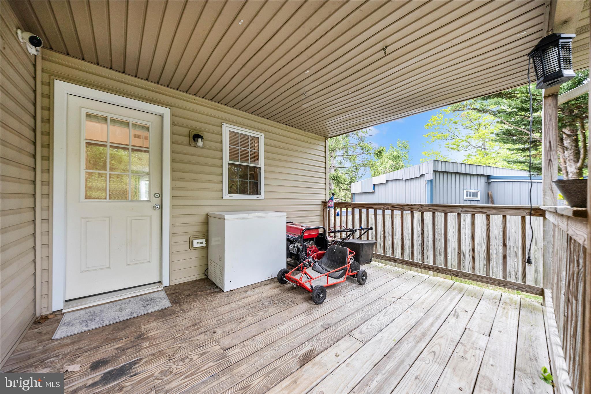 916 Harwood Road Hagerstown, MD 21740 - Photo 49 of 52 a view of a deck with wooden floor and fence