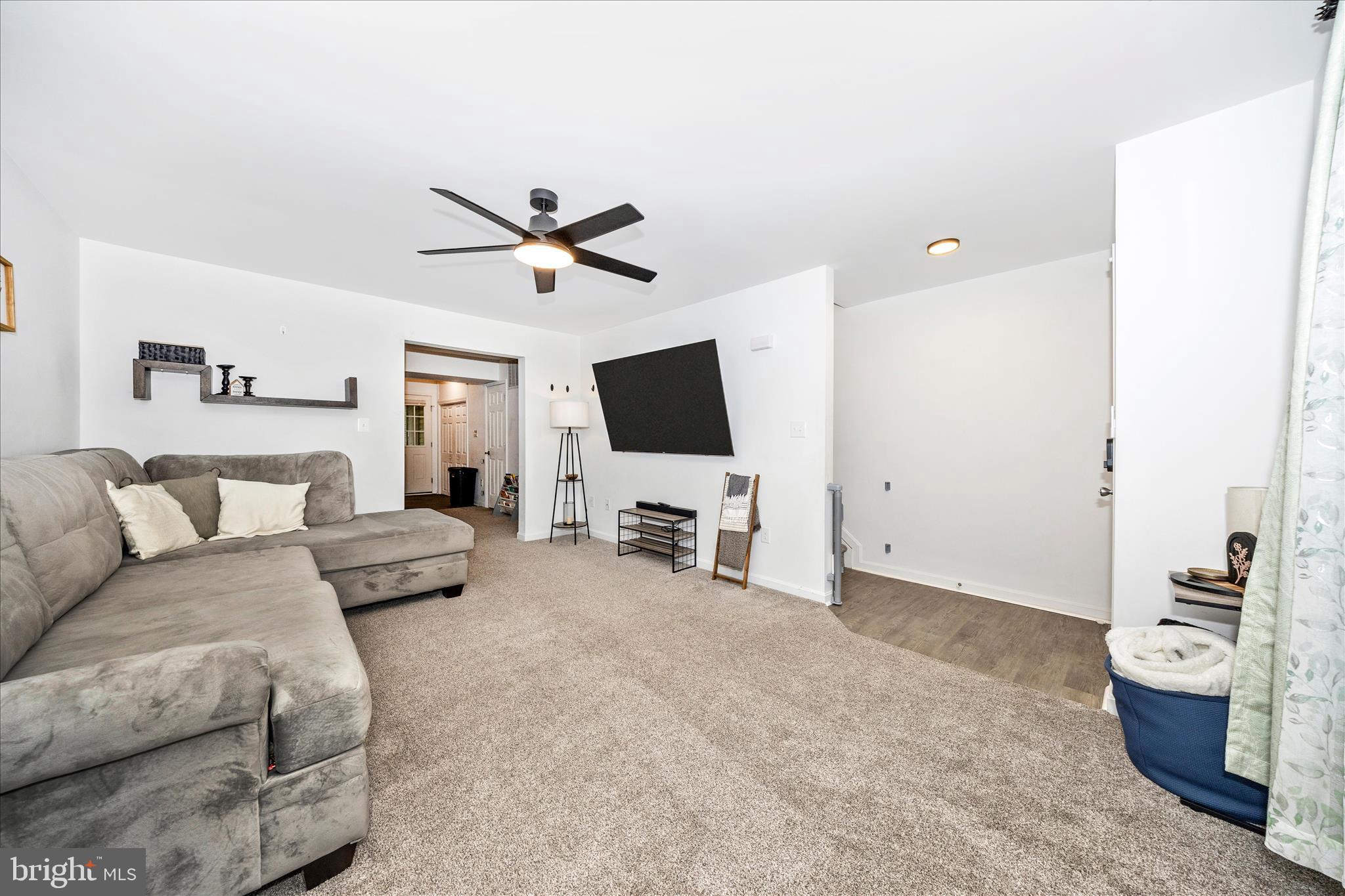916 Harwood Road Hagerstown, MD 21740 - Photo 5 of 52 a living room with furniture and a flat screen tv