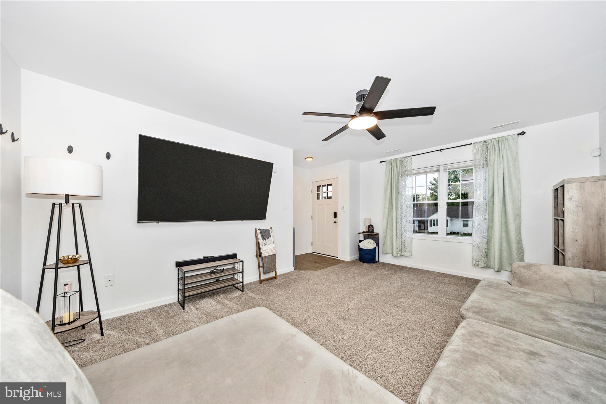 916 Harwood Road Hagerstown, MD 21740 - Photo 6 of 52 a living room with furniture and a flat screen tv