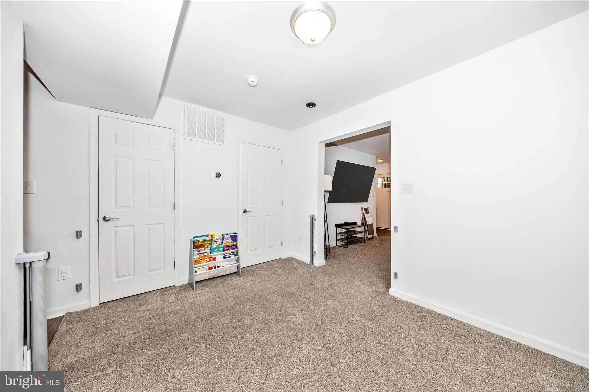 916 Harwood Road Hagerstown, MD 21740 - Photo 10 of 52 a living room with furniture and a flat tv screen