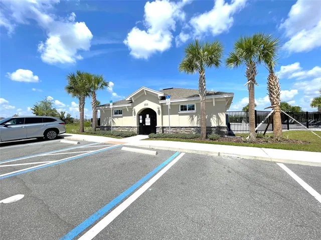a view of a swimming pool with a patio