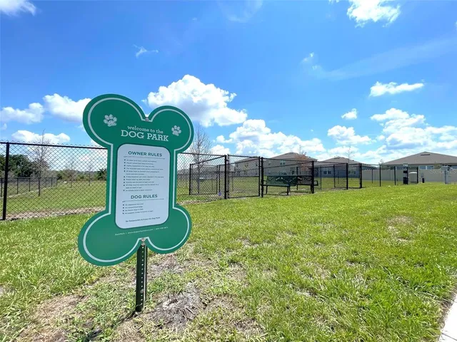 a view of a golf course with a swimming pool