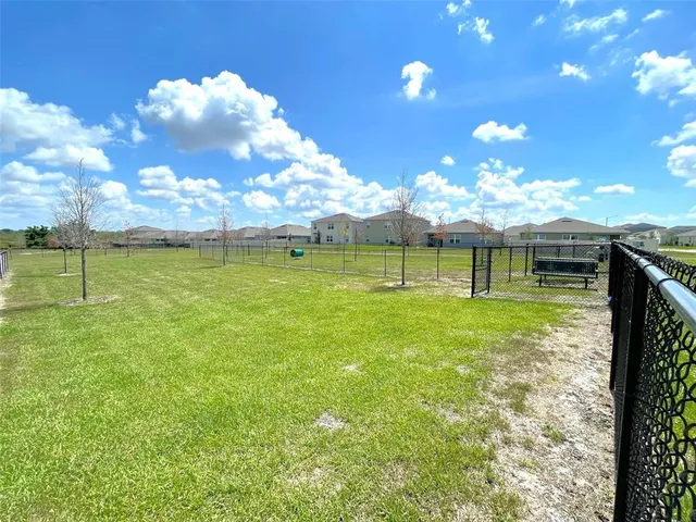 a view of a golf course with a lake