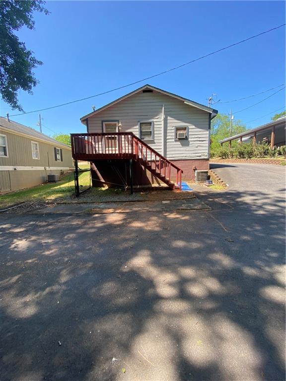 140 Line Street Buford, GA 30518 - Photo 14 of 31 a view of a house with a yard