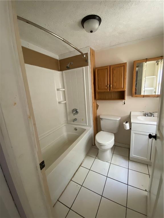 140 Line Street Buford, GA 30518 - Photo 10 of 31 a bathroom with a sink a toilet and shower