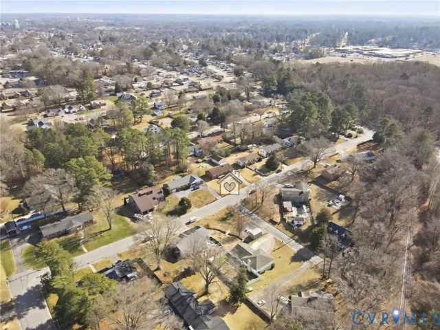 an aerial view of residential house with parking space