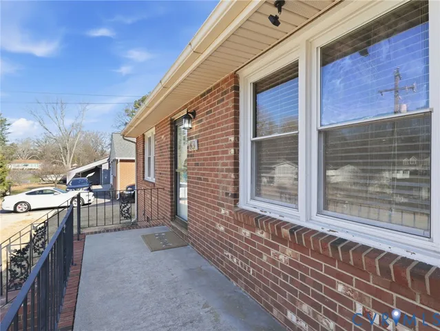 a view of a house with a large window