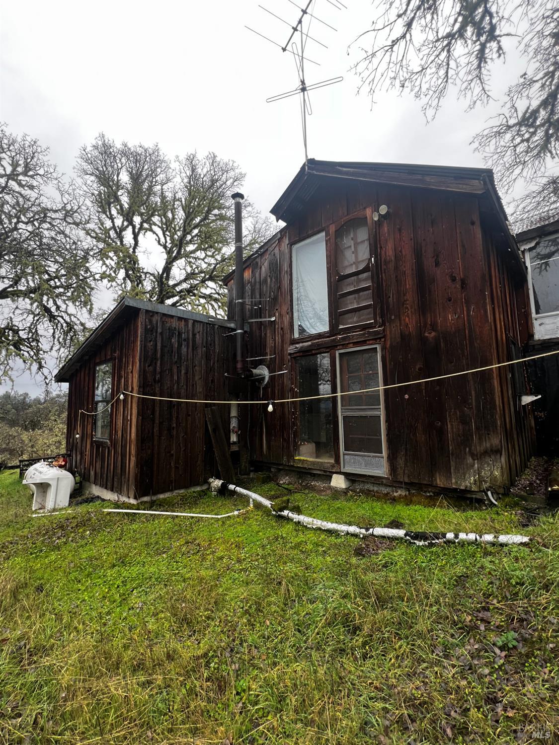 23040 Poonkinney Road Covelo, CA 95428 - Photo 14 of 77 a view of backyard with wooden fence