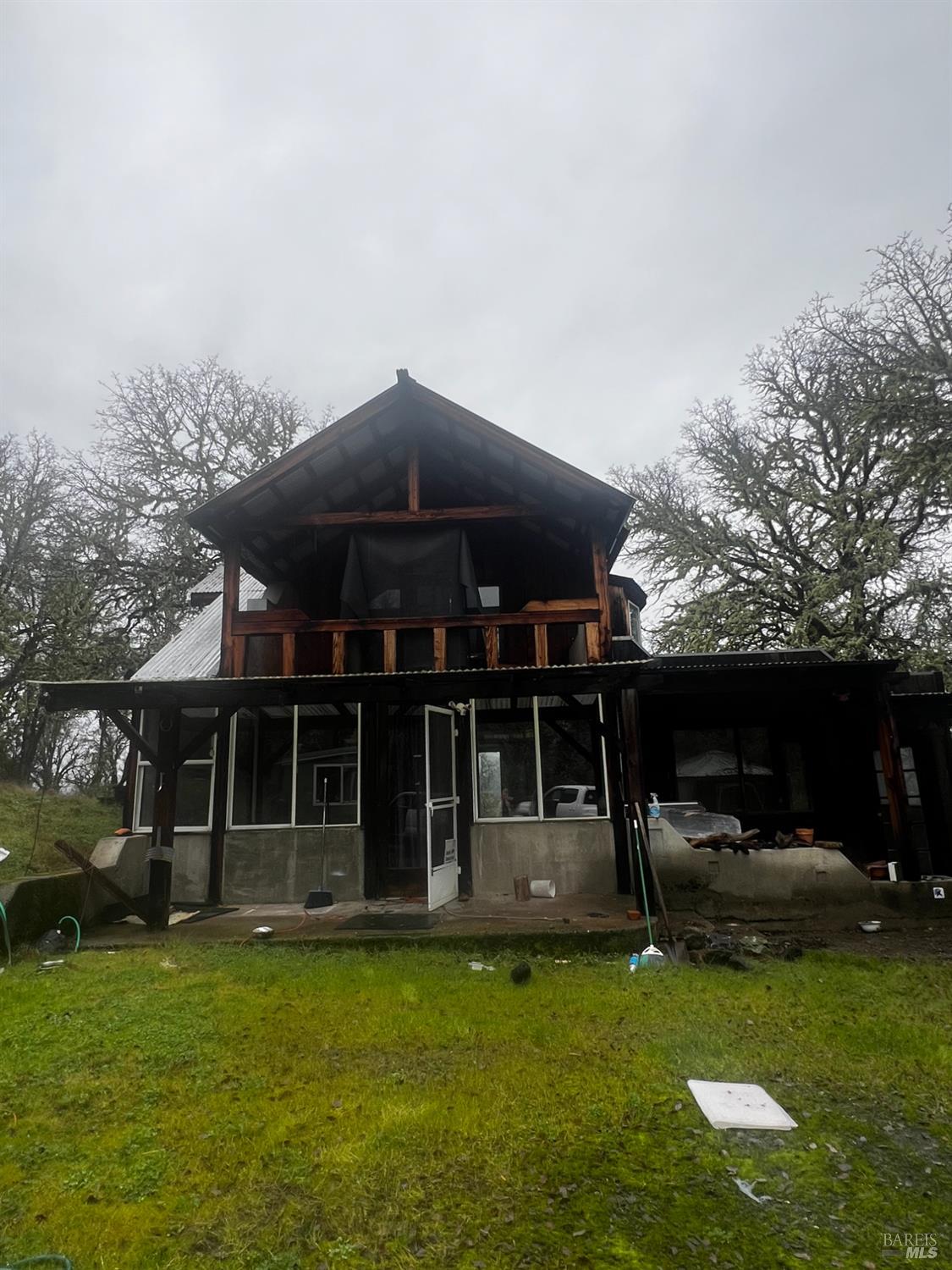 23040 Poonkinney Road Covelo, CA 95428 - Photo 15 of 77 a view of a house with backyard porch and sitting area
