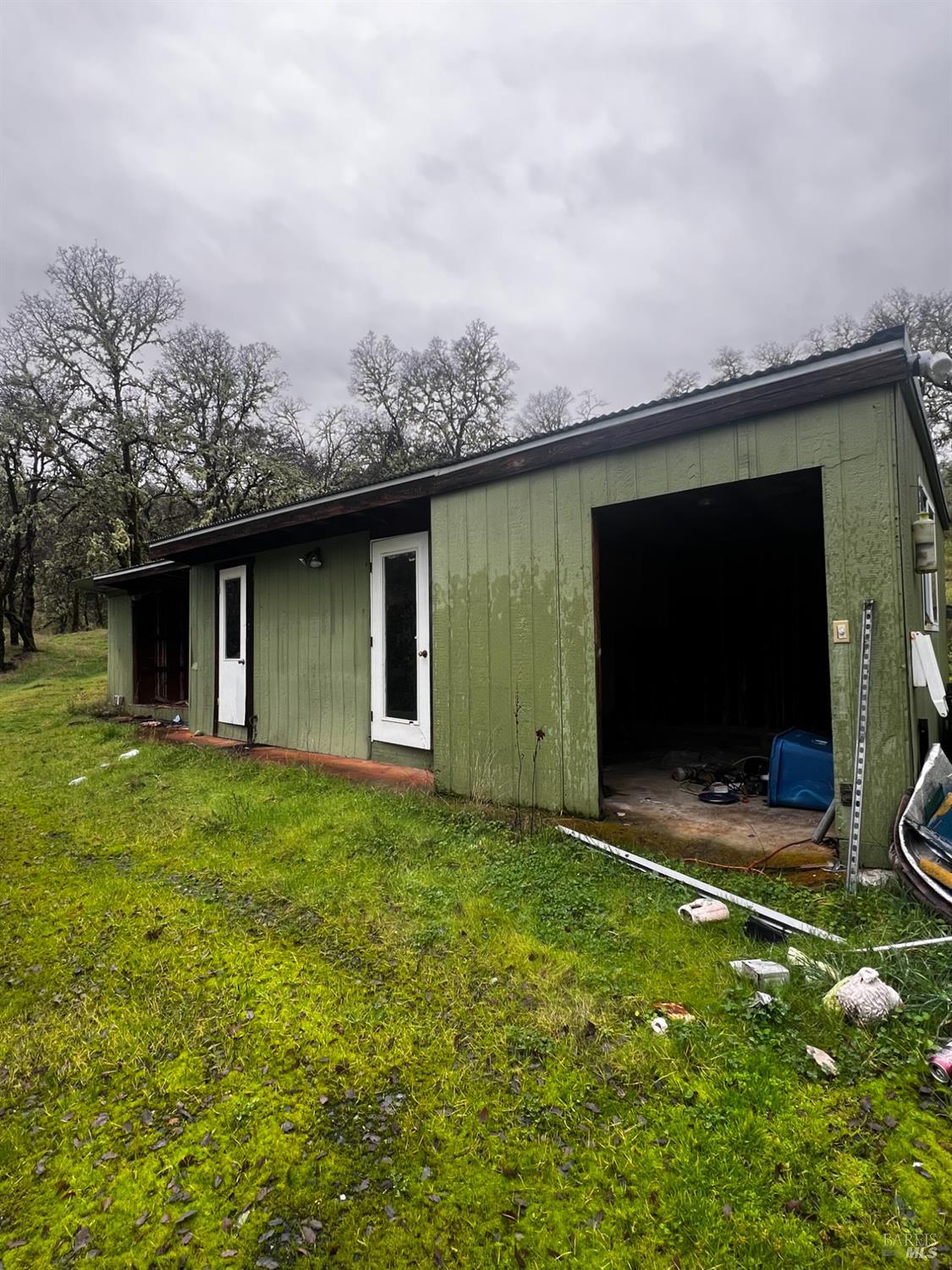 23040 Poonkinney Road Covelo, CA 95428 - Photo 20 of 77 a backyard of a house with lots of green space
