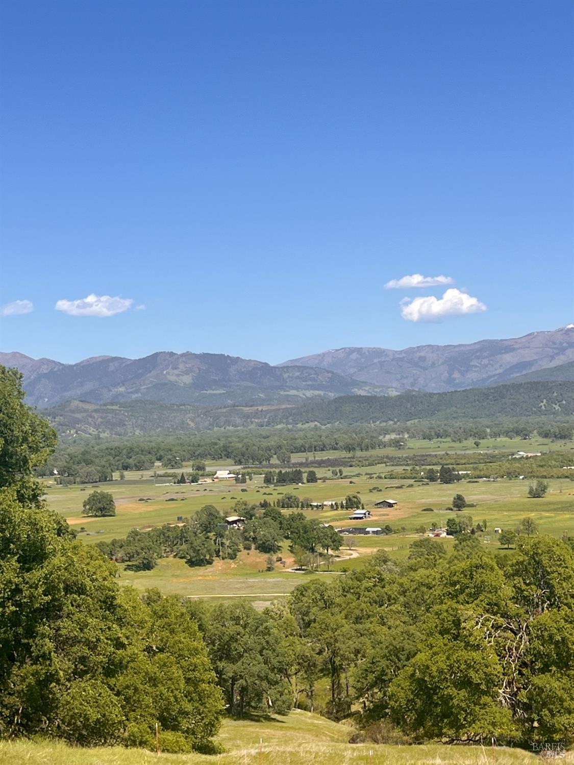 23040 Poonkinney Road Covelo, CA 95428 - Photo 2 of 77 a view of an ocean and a mountain