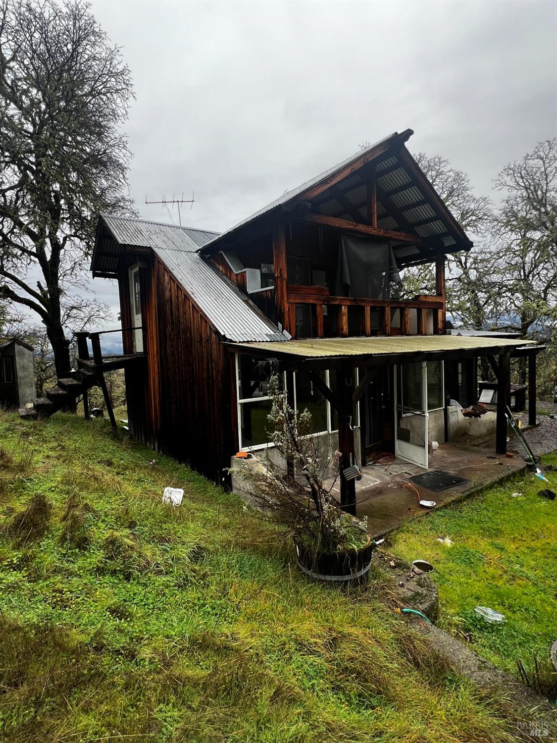 23040 Poonkinney Road Covelo, CA 95428 - Photo 23 of 77 a view of a house with backyard and sitting area