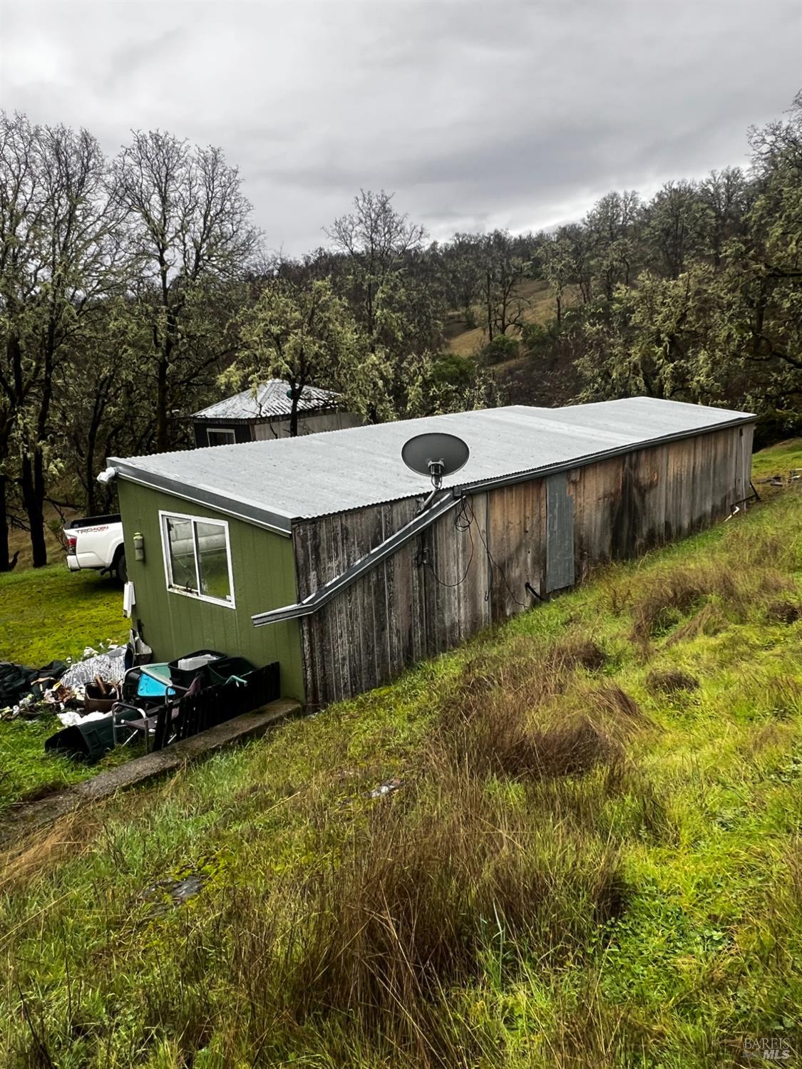 23040 Poonkinney Road Covelo, CA 95428 - Photo 24 of 77 a view of a house with a yard