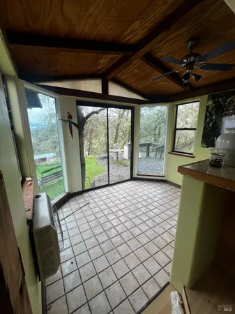a house view with a sitting space and garden