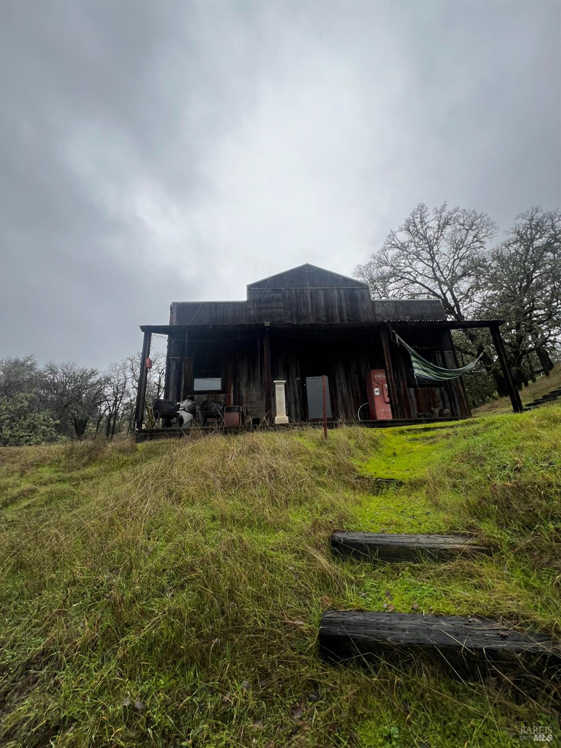 23040 Poonkinney Road Covelo, CA 95428 - Photo 59 of 77 a view of a house with a yard and tree s