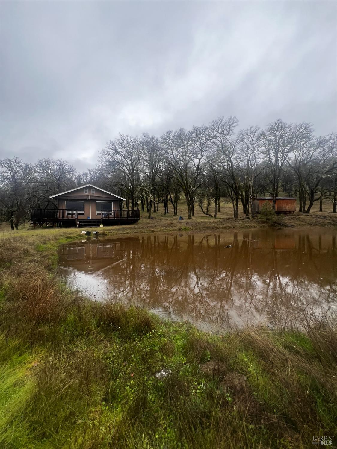 23040 Poonkinney Road Covelo, CA 95428 - Photo 69 of 77 a view of a lake with houses in back