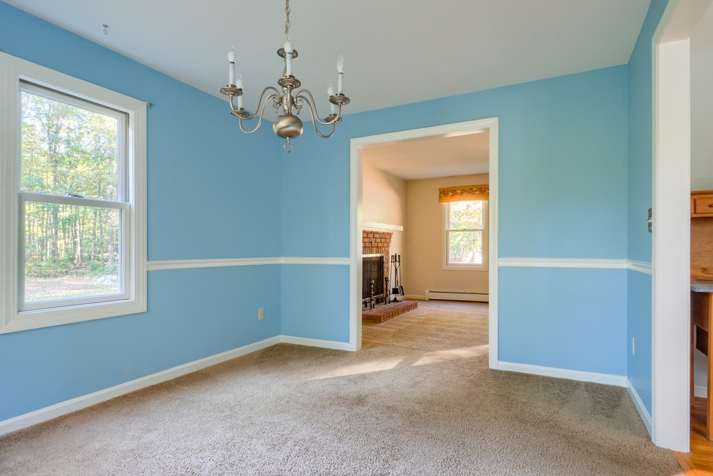 140 Bullard Road Oakham, MA 01068 - Photo 15 of 29 wooden floor in an empty room with a window