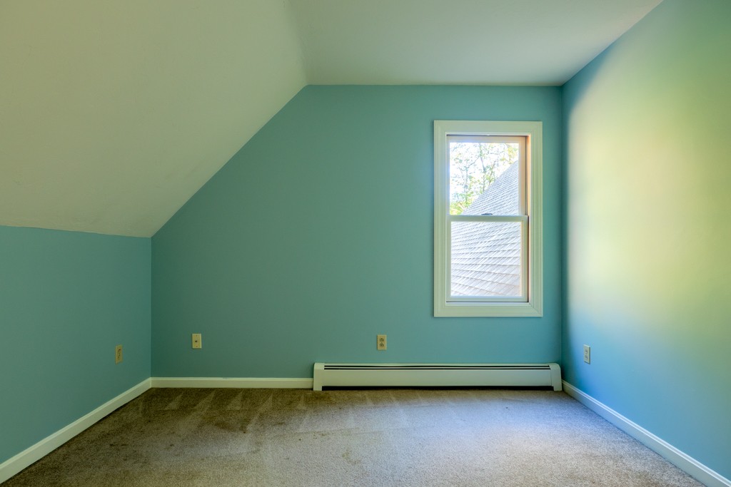 140 Bullard Road Oakham, MA 01068 - Photo 20 of 29 an empty room with a window