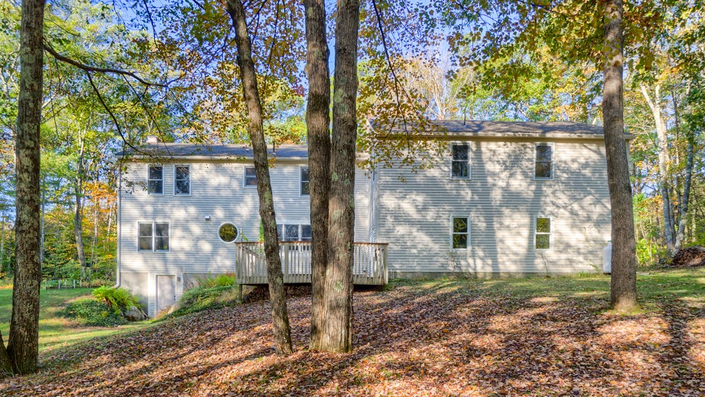 140 Bullard Road Oakham, MA 01068 - Photo 28 of 29 a backyard of a house with lots of green space