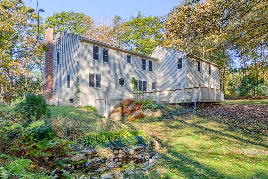 140 Bullard Road Oakham, MA 01068 - Photo 29 of 29 a view of a house with a yard