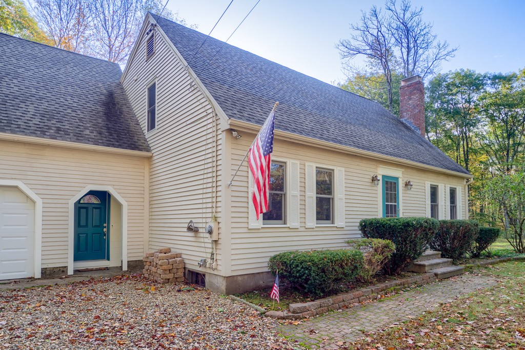 140 Bullard Road Oakham, MA 01068 - Photo 3 of 29 a view of a house with a yard and plants