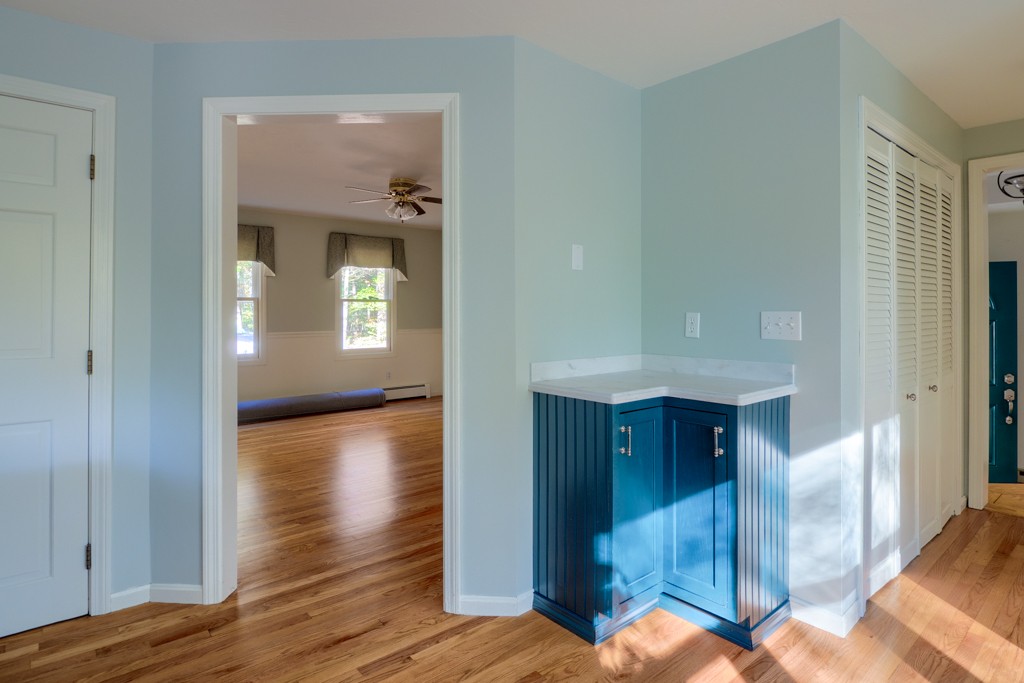140 Bullard Road Oakham, MA 01068 - Photo 10 of 29 a view of a hallway view with wooden floor and staircase