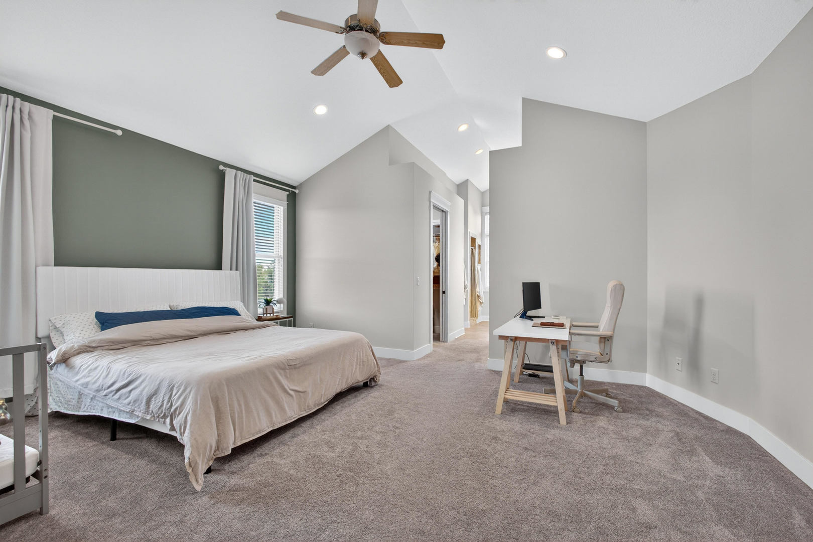 5700 Emily Road Bettendorf, IA 52722 - Photo 30 of 58 a bedroom with a bed and a table