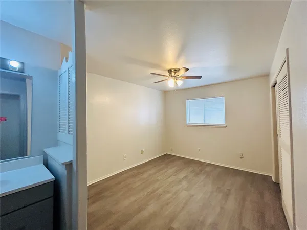 a view of a room with a fan