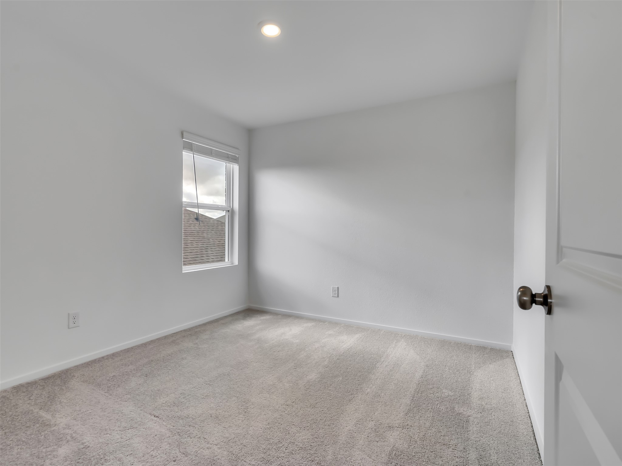 3041 Colusa Rdg Drive Katy, TX 77493 - Photo 20 of 26 a view of an empty room with a window