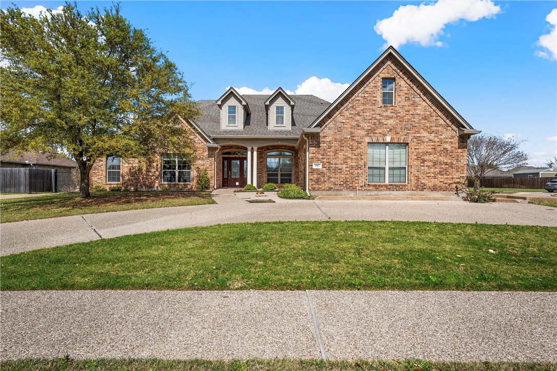 403 South Cedar Ridge Circle Robinson, TX 76706 - Photo 2 of 46 a front view of a house with a yard