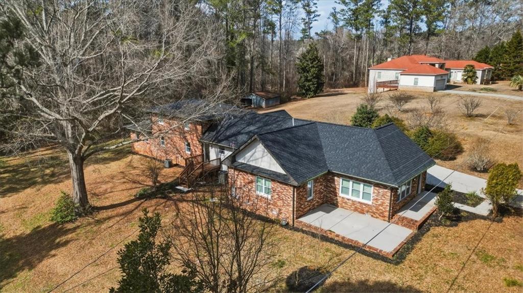 4911 Lower Jersey Road Oxford, GA 30054 - Photo 47 of 56 a aerial view of a house with a yard basket ball court and outdoor seating