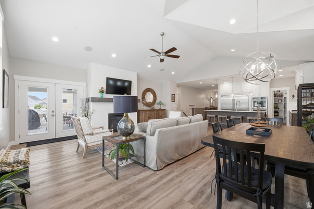 2109 Sunflower Lane Mapleton, UT 84664 - Photo 22 of 43 Gourmet Kitchen Opens Seamlessly into the Great Room w/Fireplace & Plenty of Dining Space! Entrance to the Covered Deck and Backyard
