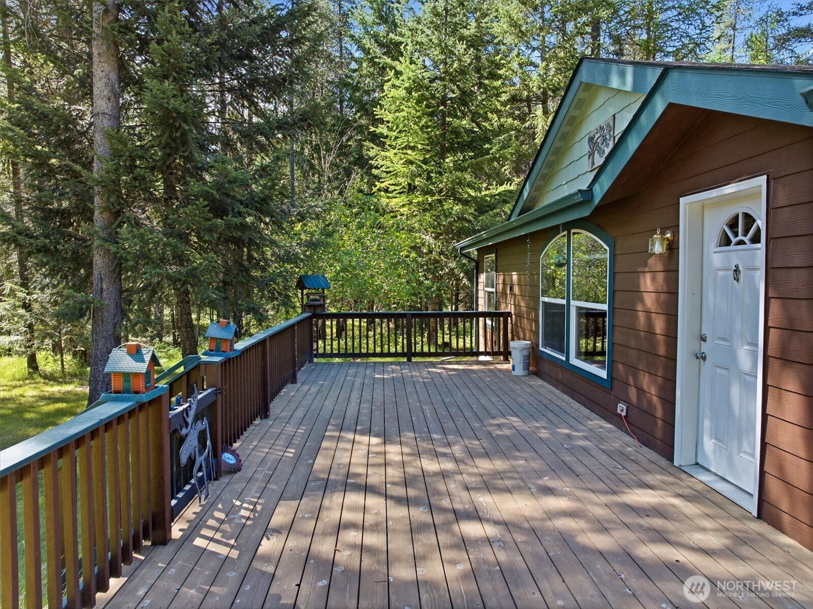 1142 Driskill Road Newport, WA 99156 - Photo 33 of 40 a view of outdoor space with deck and yard